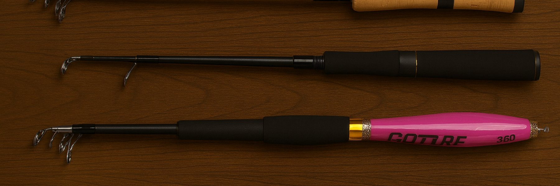 Telescopic fishing rods with cork and EVA handles, including pink carbon rods, neatly arranged on wooden surface