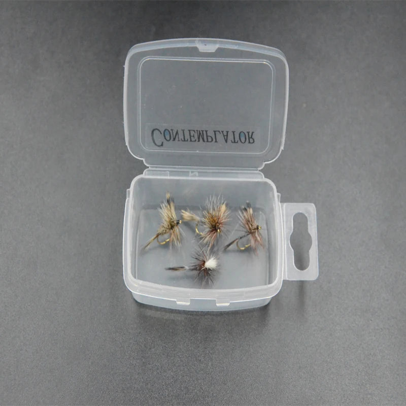 Adams dry flies shown inside clear plastic fly box