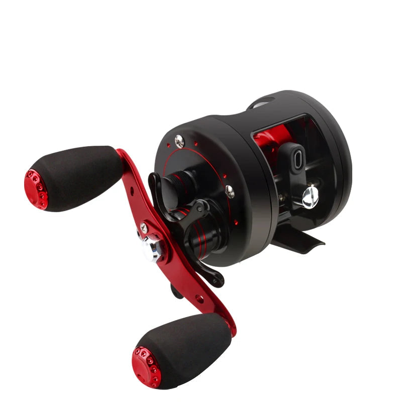 Red and black baitcasting drum reel with aluminium spool and dual grip handle, built for smooth and accurate casting control