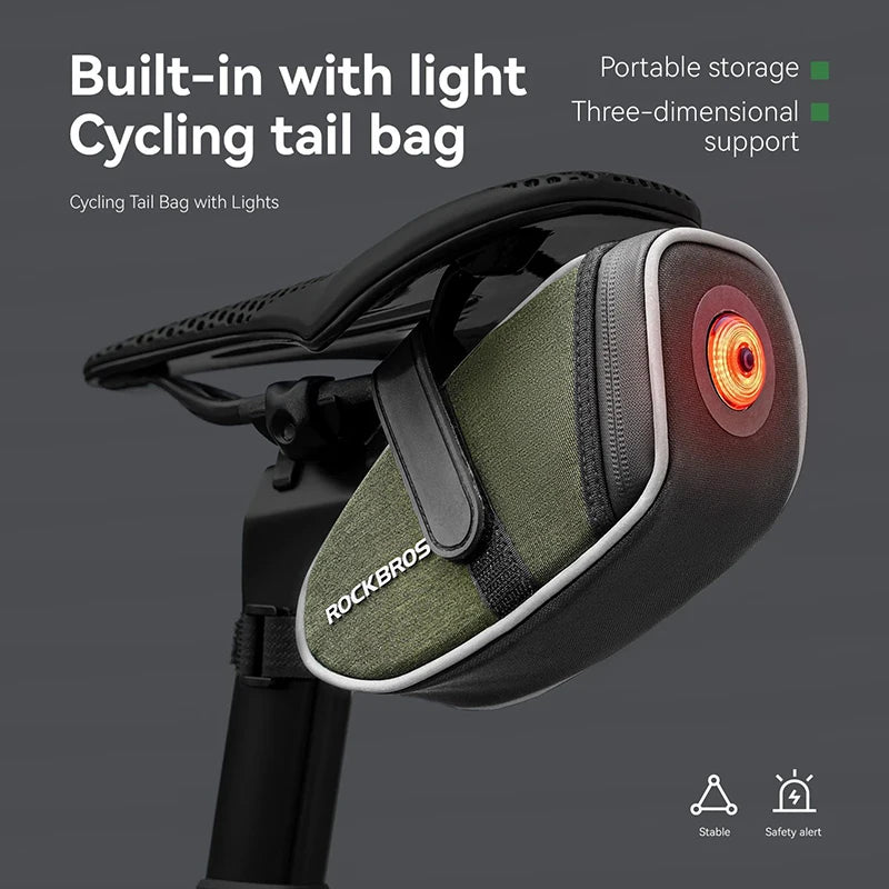 Bike saddle bag mounted under seat with circular rear light illuminated