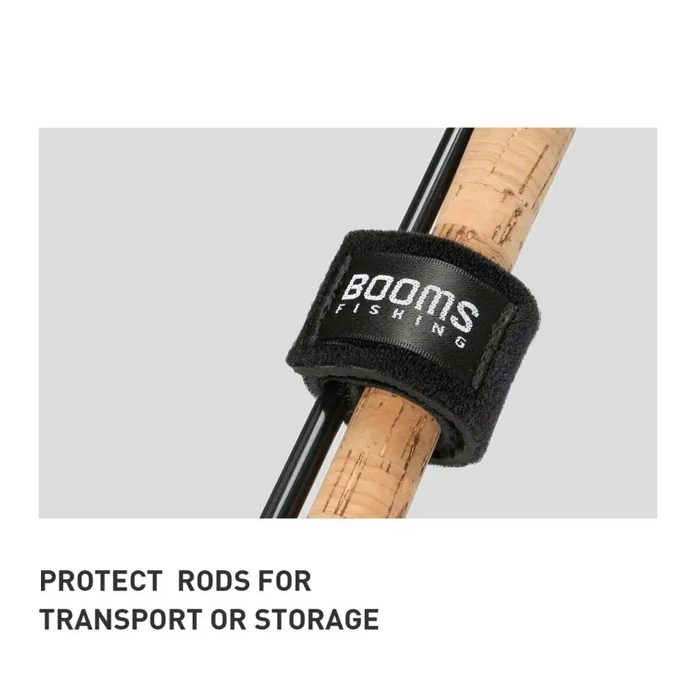 BOOMS FISHING rubber strap securing rod handle to prevent movement during transport