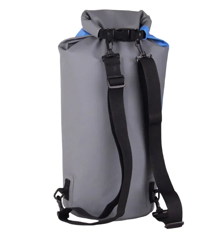 Buoyant inflatable dry bag with shoulder straps
