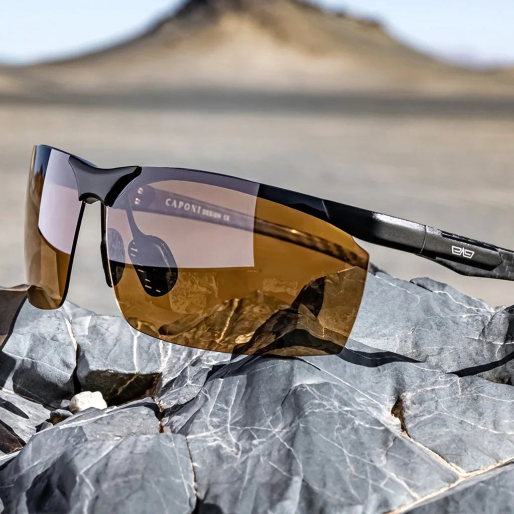 CAPONI photochromic polarised sunglasses with carbon fibre arms and UV400 lenses for driving, cycling, and fishing