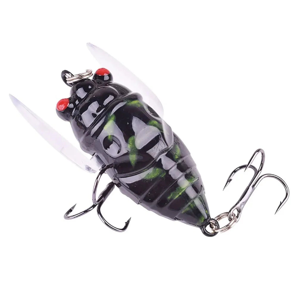 Cicada-shaped fishing lure with wings and treble hooks