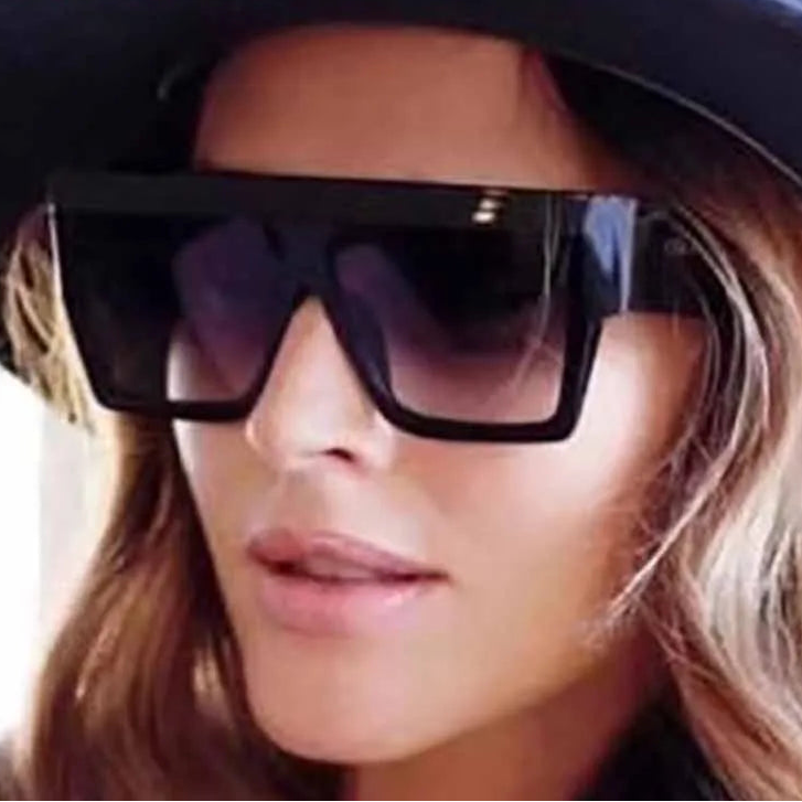 DOHOHDO oversized square sunglasses with black gradient UV400 lenses shown in outdoor lifestyle setting