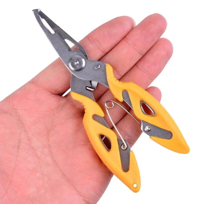 Compact fishing pliers with yellow handles shown in hand