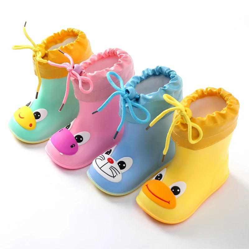 Children’s cartoon animal gumboots shown in multiple bright colour options