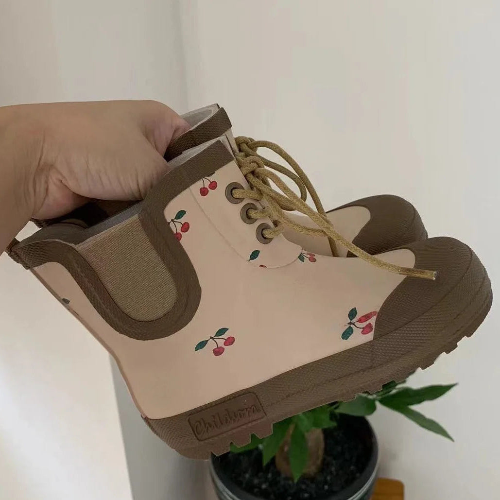 Pink lace up kids mid calf rain gumboots with waterproof finish