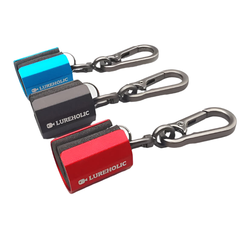 Set of LUREHOLIC aluminium fishing rod holders in blue, red, and black with clip attachments