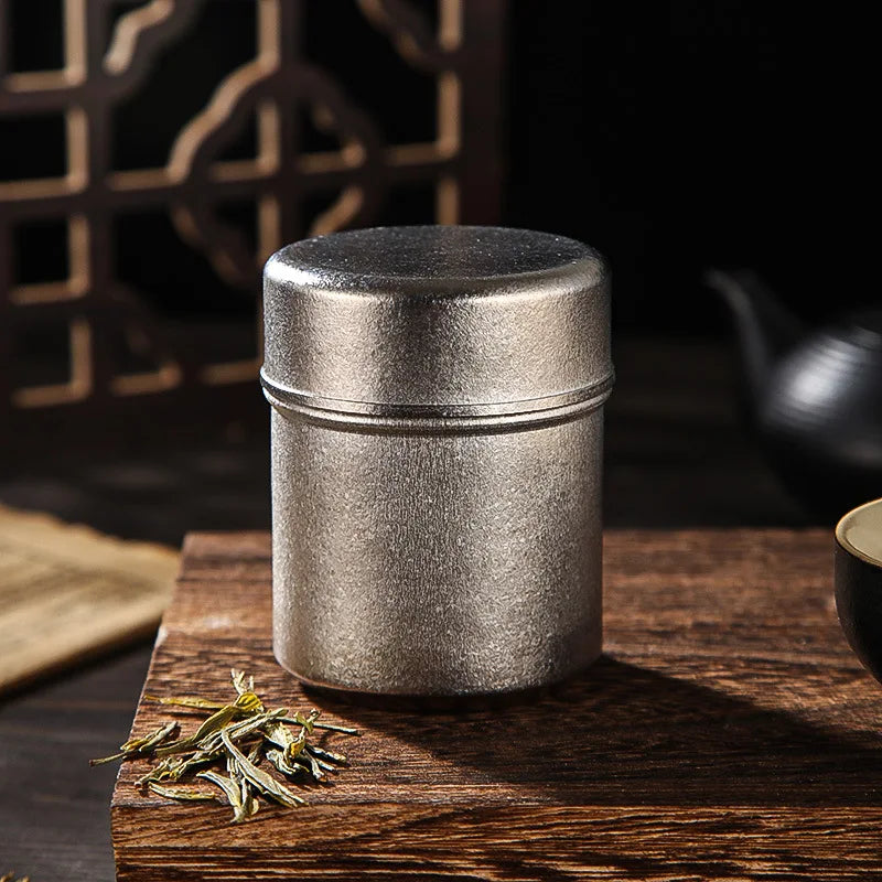 Compact sealed titanium tea can with crystalline finish, ideal for storing tea leaves or dry goods