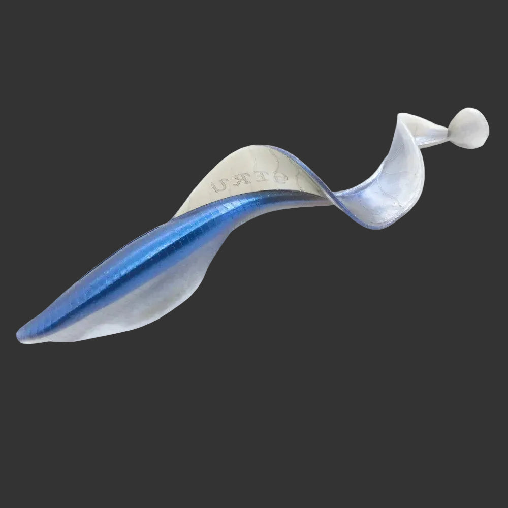 Soft plastic grub fishing lure with curled tail on dark background