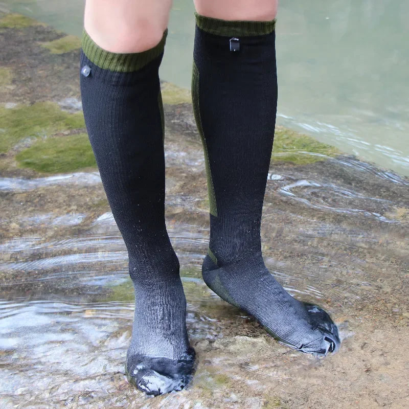 Waterproof knee high fishing socks worn on wet rocks