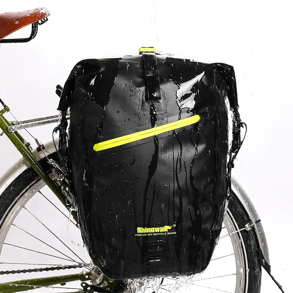 Waterproof rear rack pannier bike bag in heavy rain