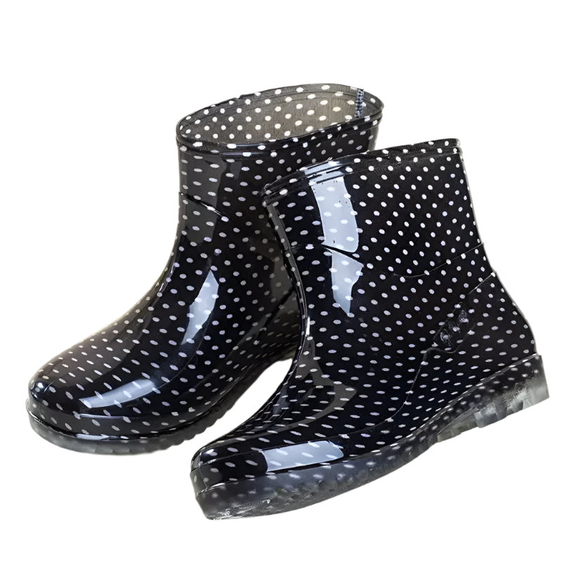 Women’s ankle gumboots in black with white polka dot pattern