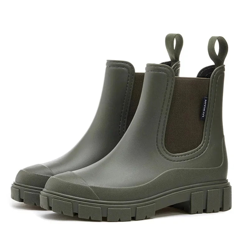 Women’s Chelsea ankle rain boots in olive with platform sole side view