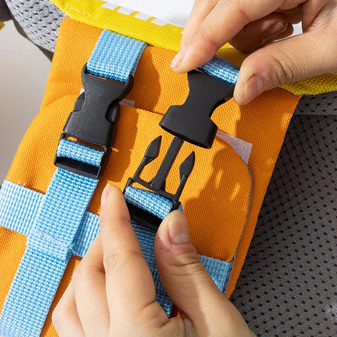 Adjustable buckle straps on dog life jacket vest