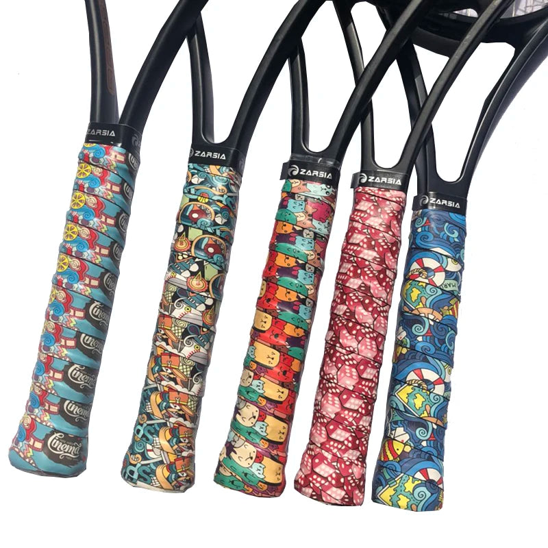 Set of sports rackets fitted with assorted patterned grip tapes in vivid colours