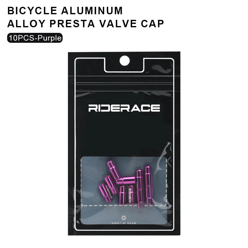 Packaged pink aluminium Presta valve caps for bicycle tyres