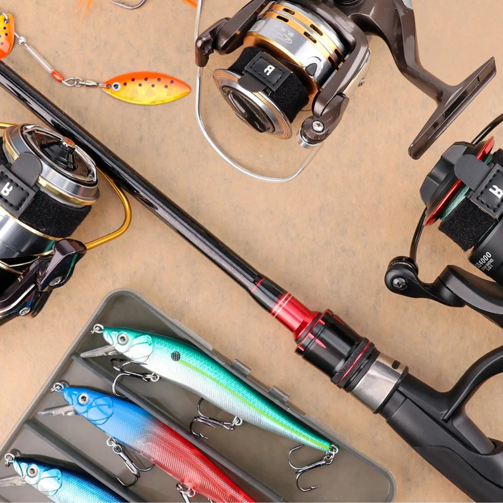 BOOMS FISHING reel covers shown in use on multiple rods for tangle-free transport and tidy storage