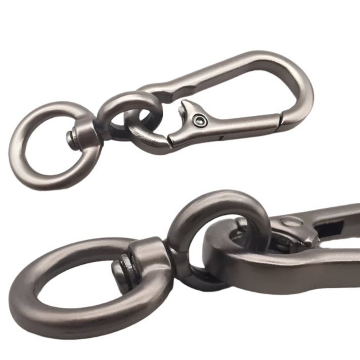 Close-up of aluminium fishing rod holder clip with carabiner and keyring connector