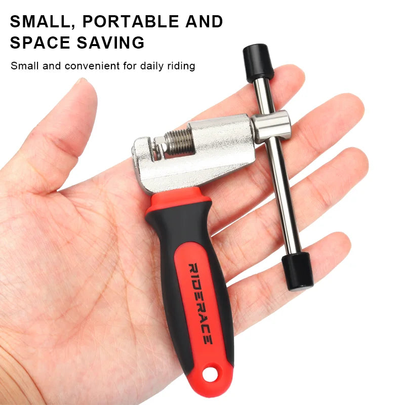 Compact bicycle chain breaker tool shown in hand for scale