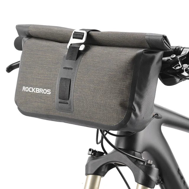 Convertible bikepacking handlebar bag with strap