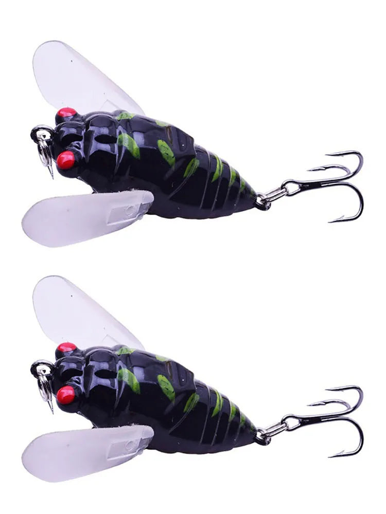 Two dark-coloured cicada-style fishing lures shown side by side