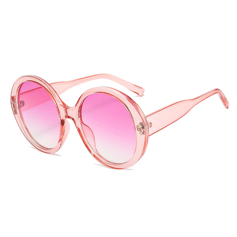 DOHOHDO pink oversized round sunglasses with soft rose gradient lenses offering UV400 protection and feminine vintage style