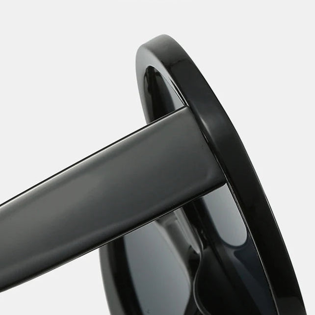 DOHOHDO oversized round sunglasses side view highlighting curved arms and sleek black finish for everyday fashion