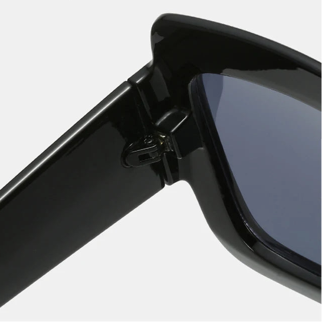 Close-up of DOHOHDO oversized square sunglasses double hinge detail showing durable construction