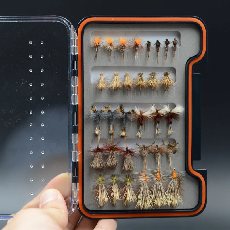 Fly fishing dry fly assortment displayed inside open fly box