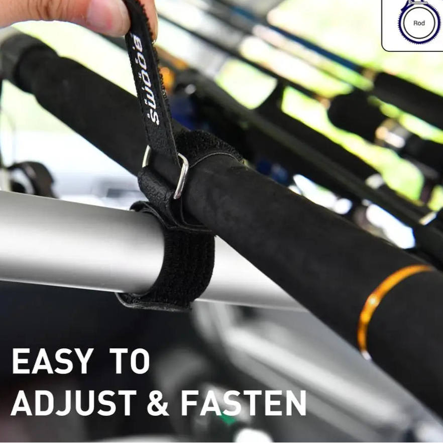 Angler securing fishing rod using adjustable strap with stainless buckle and soft protective lining