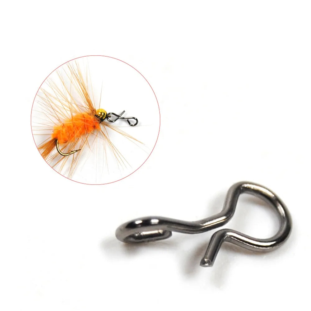 Small fishing snap connector attached to fly lure for fast line change