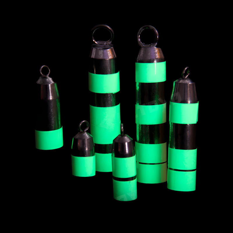 Fishing rods wrapped with luminous green waterproof tape glowing brightly in darkness