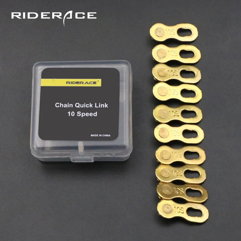 Gold bicycle chain master links arranged in connected strip