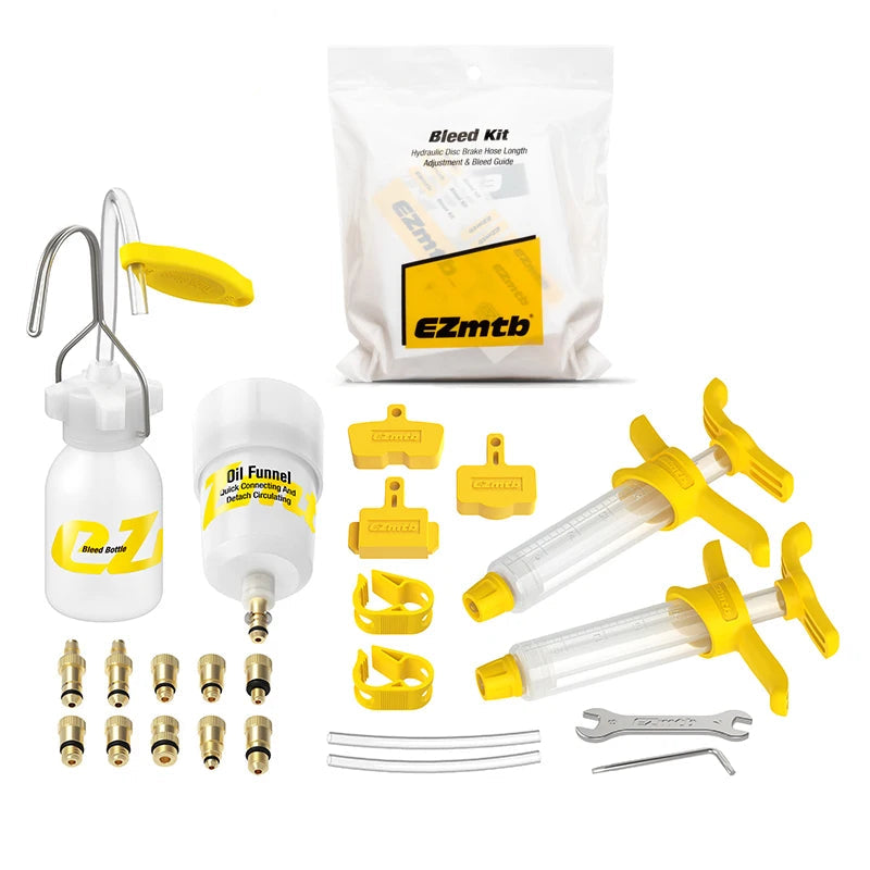 Hydraulic brake bleed kit components arranged for clear identification
