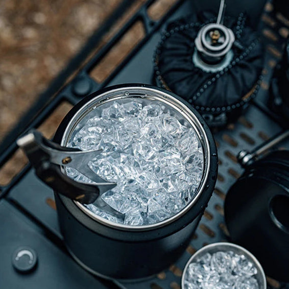 Insulated ice bucket filled with ice cubes