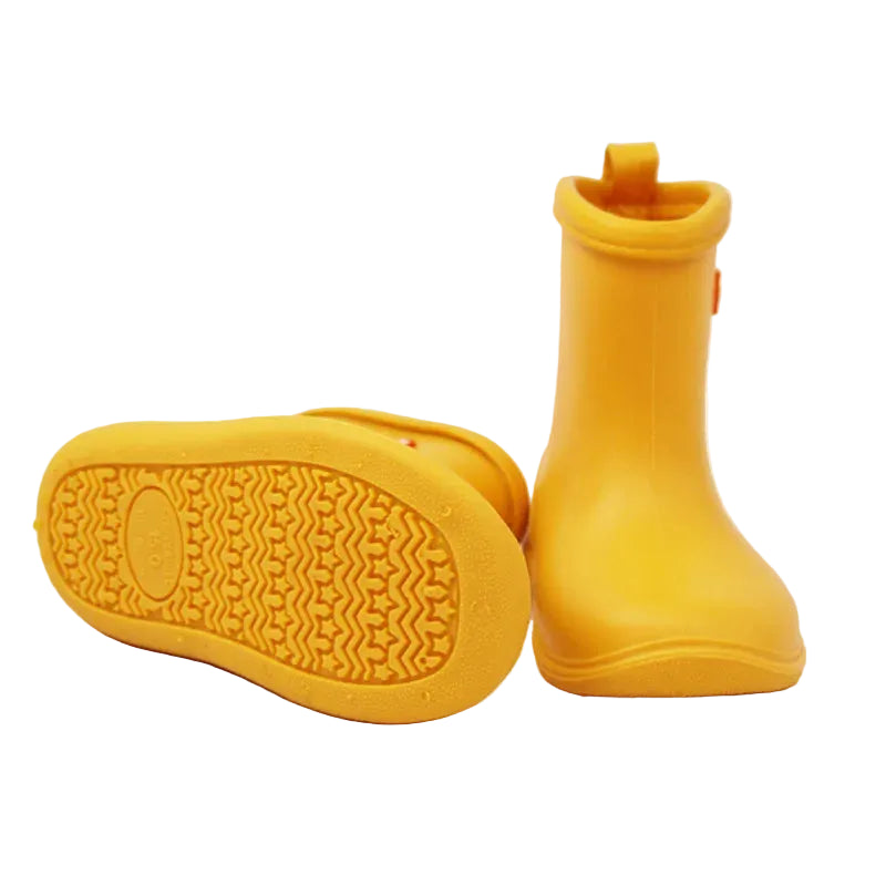 Non slip rubber sole detail on yellow kids ankle gumboots