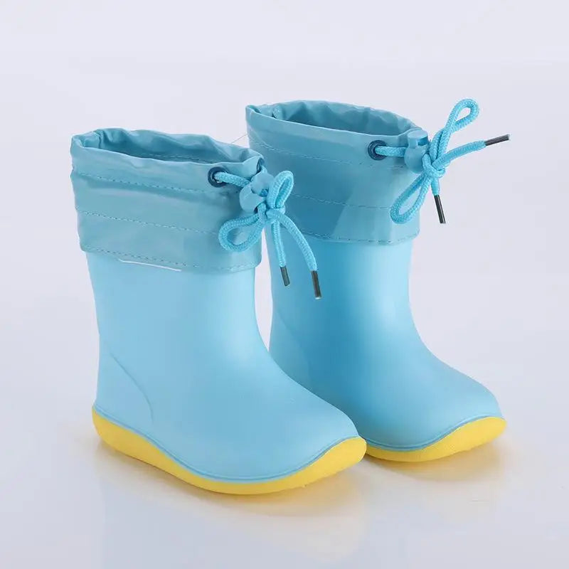 Yellow and blue lined kids rain boots for wet weather school use