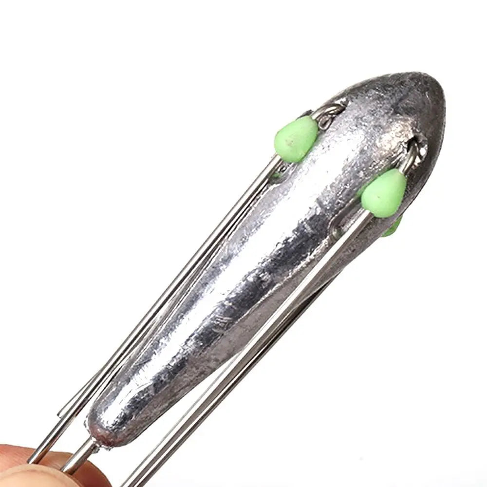 Long cast breakaway sinker with aerodynamic surfcasting profile