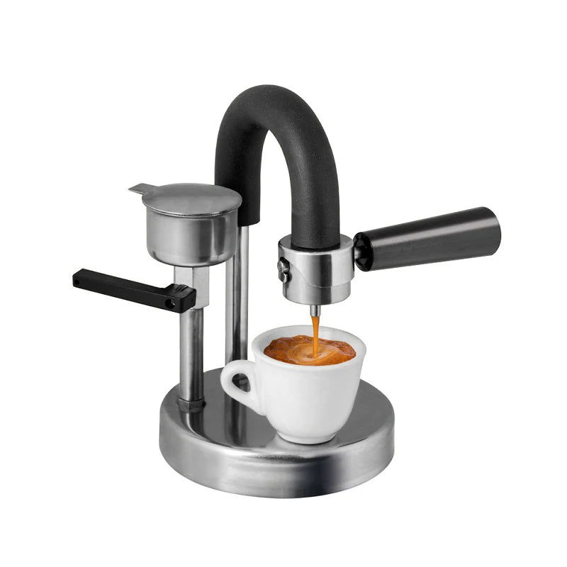 Manual stainless steel espresso maker brewing coffee into cup