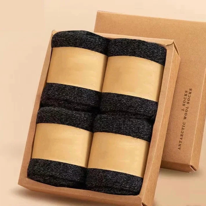 Four pairs dark merino wool crew socks in box