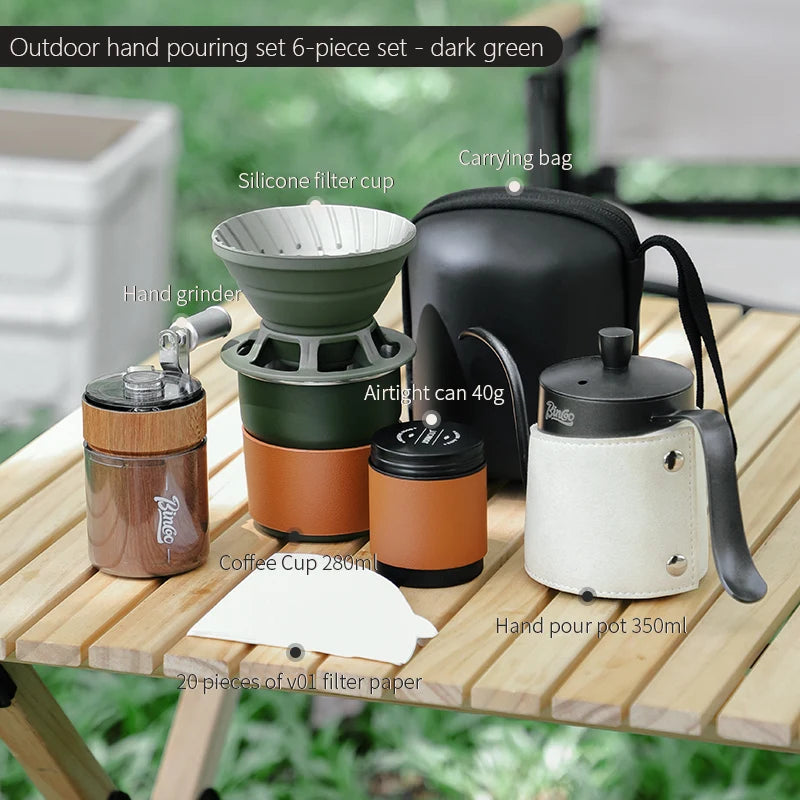 Complete outdoor coffee set with grinder, dripper, kettle, and cups displayed in dark green edition