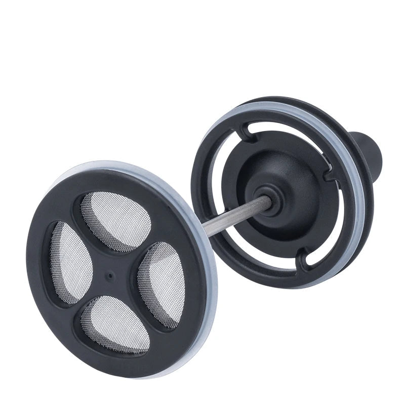 Close-up of reusable French press filter and lid components made from titanium and food-grade silicone