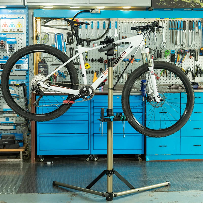 ROCKBROS bike repair stand holding bicycle during maintenance