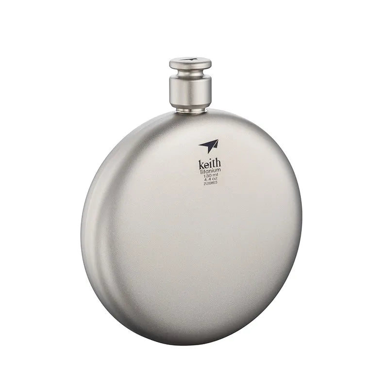 Front view of round titanium flask minimalist design