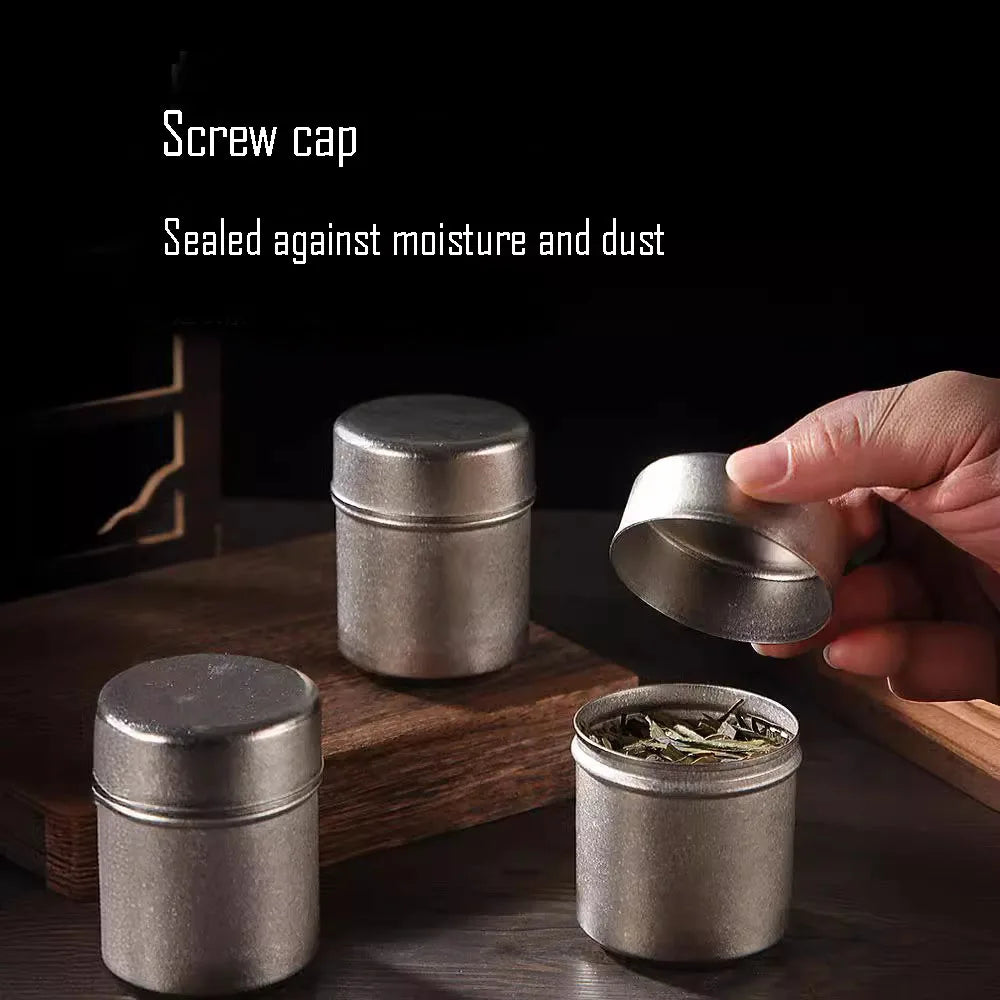 Close-up of titanium tea can screw cap showing dust-proof and moisture-resistant seal for freshness
