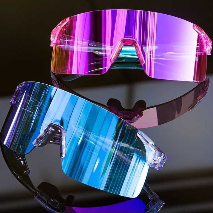 SCVCN photochromic sports sunglasses with purple and blue mirrored UV400 lenses on black background for outdoor performance use