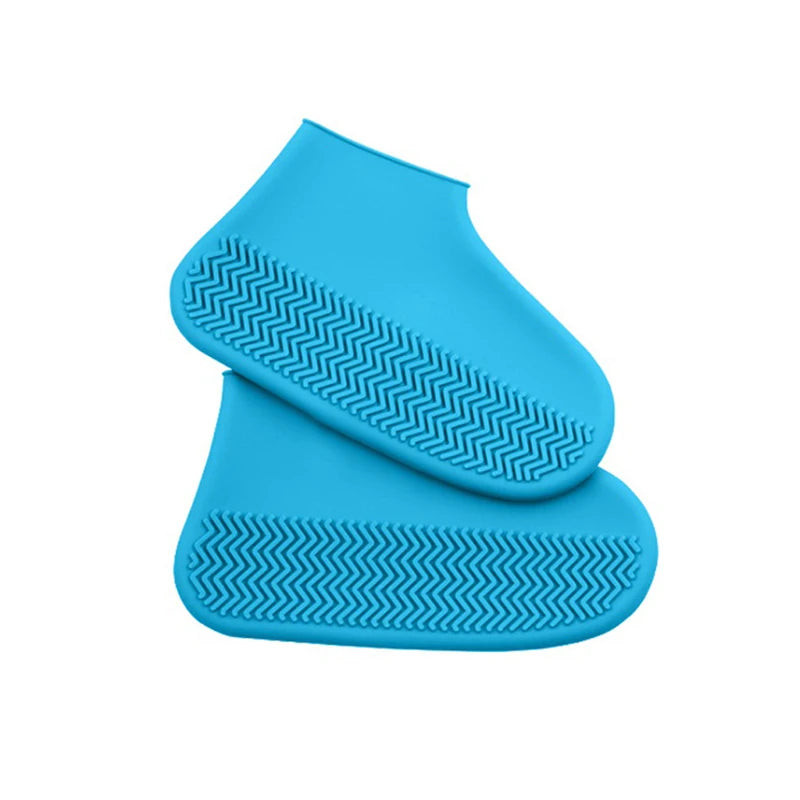 Blue silicone shoe covers shown as matching pair from side view