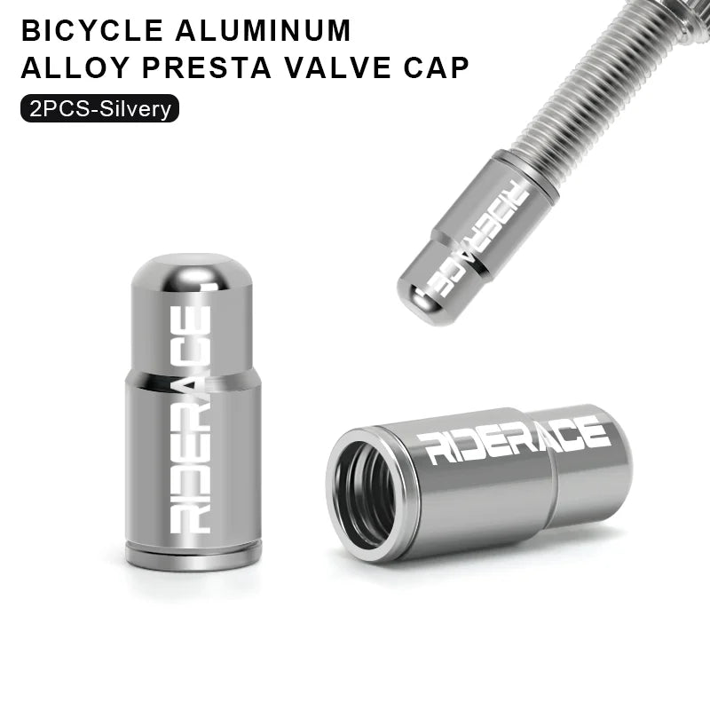 Pair of silver aluminium Presta valve caps fitted to bicycle valve stems